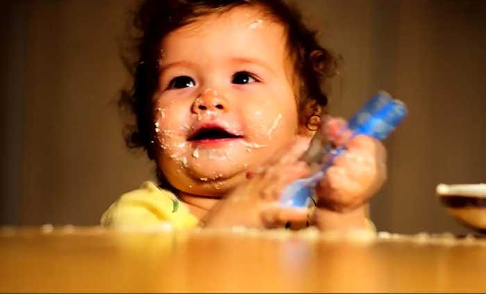 Baby enjoying dinner