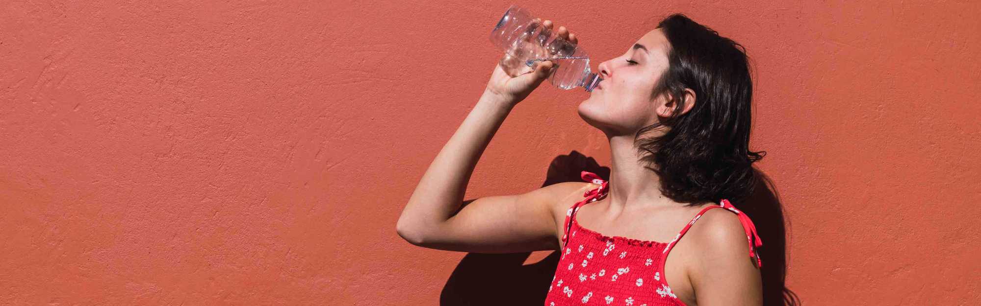 Decorative image of a woman drinking water